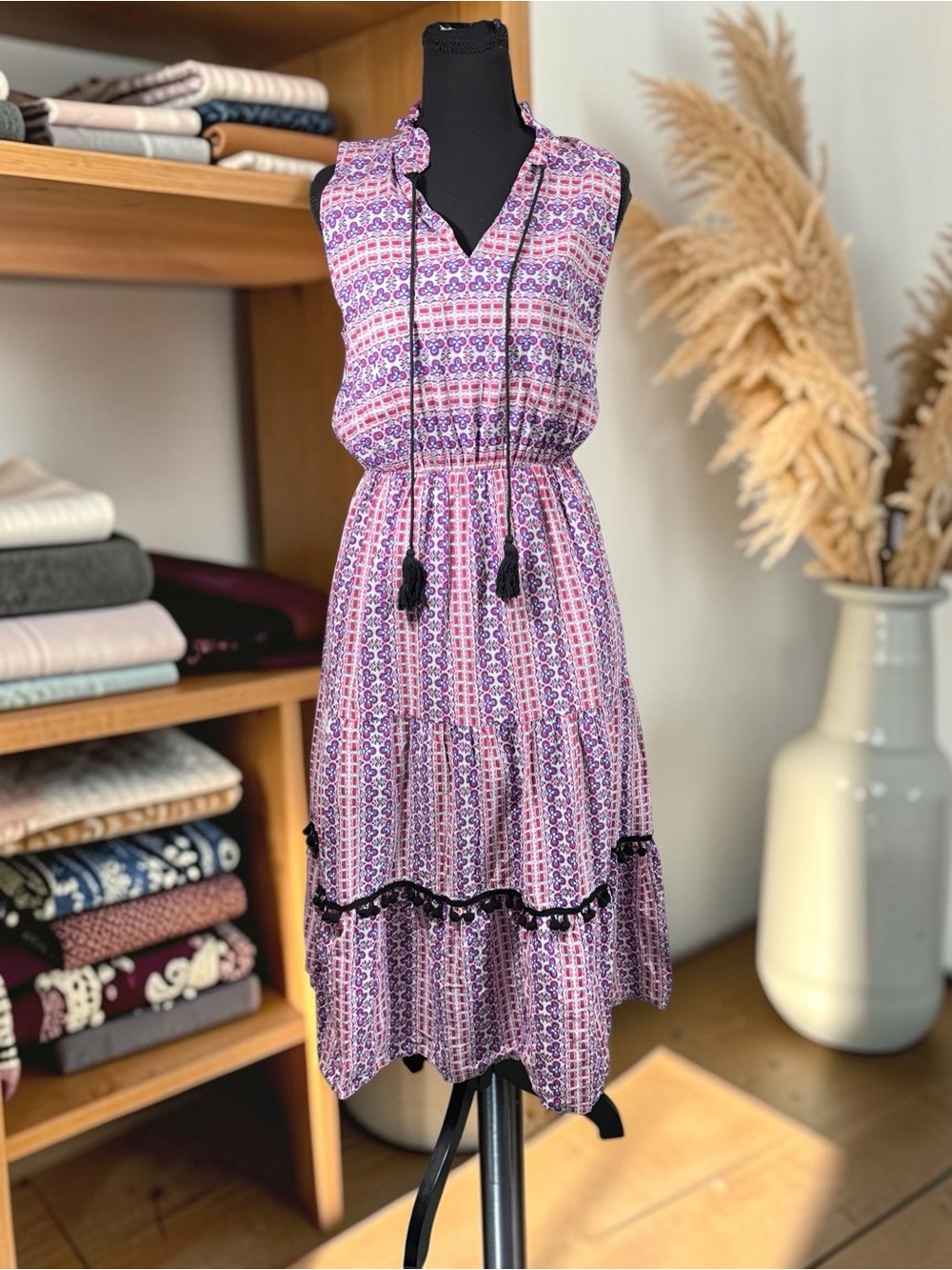 Sleeveless Tiered Midi Dress in Pink and Purple Print with Tassel Tie